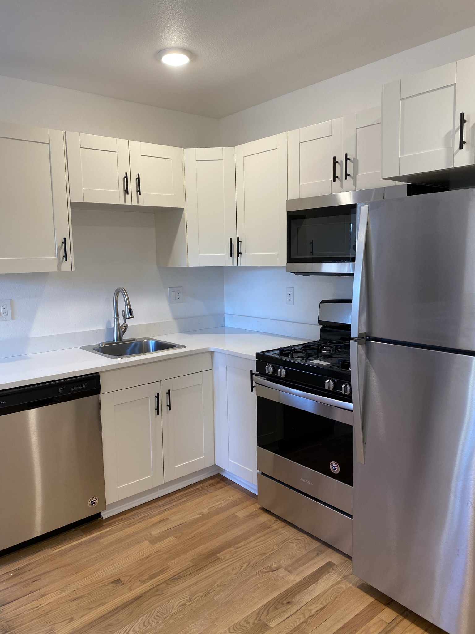 Updated kitchen in The Flats at Highland Park