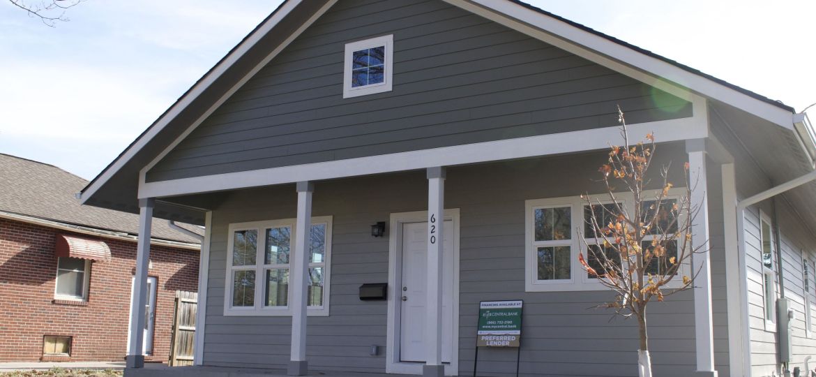 Two-story gray home with front porch